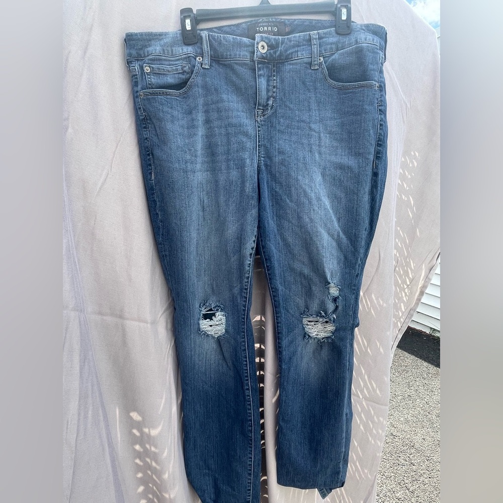 Torrid Blue Straight Leg Jeans with Distressed Details